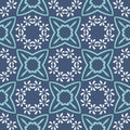Navy blue wallpaper with turquoise geometric floral motifs, ideal for modern interiors