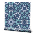 Navy blue wallpaper with turquoise geometric floral motifs, ideal for modern interiors