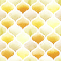 Geometric wallpaper pattern with Moroccan-inspired quatrefoil shapes in watercolor shades of yellow, gold, and soft green on a white background